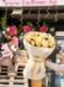 An elegant arrangement of delicate roses
